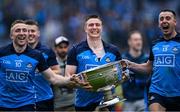 30 July 2023; Dublin players Paddy Small, 10, John Small and Cormac Costello, 13, celebrate with the Sam Maguire Cup after their side's victory in the GAA Football All-Ireland Senior Championship final match between Dublin and Kerry at Croke Park in Dublin. Photo by Piaras Ó Mídheach/Sportsfile