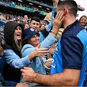30 July 2023; James McCarthy of Dublin celebrates with his mother Marian, centre, and wife Clodagh after the GAA Football All-Ireland Senior Championship final match between Dublin and Kerry at Croke Park in Dublin. Photo by Brendan Moran/Sportsfile