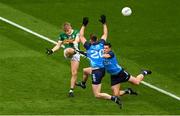 30 July 2023; Killian Spillane of Kerry scores a point despite the challenge of Seán MacMahon, left, and David Byrne during the GAA Football All-Ireland Senior Championship final match between Dublin and Kerry at Croke Park in Dublin. Photo by Daire Brennan/Sportsfile