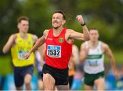 30 July 2023; John Fitzsimons of Kildare AC, Kildare, celebrates winning the men's 800m during day two of the 123.ie National Senior Outdoor Championships at Morton Stadium in Dublin. Photo by Stephen Marken/Sportsfile