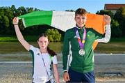 29 July 2023; Team Ireland flag bearers Maeve McGuinness, left, and Conor Murphy before the closing ceremony of the 2023 Summer European Youth Olympic Festival in Maribor, Slovenia. Photo by Tyler Miller/Sportsfile