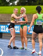 30 July 2023; Sarah Lavin of Emerald AC, Limerick, centre, is congratulated by  Lucy May Sleeman of Leevale AC, Cork, left, after  winning the women's 100m during day two of the 123.ie National Senior Outdoor Championships at Morton Stadium in Dublin. Photo by Sam Barnes/Sportsfile