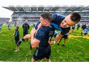 30 July 2023; Stephen Cluxton, bottom, and Eoin Murchan of Dublin after the GAA Football All-Ireland Senior Championship final match between Dublin and Kerry at Croke Park in Dublin. Photo by David Fitzgerald/Sportsfile
