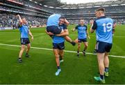 30 July 2023; Niall Scully of Dublin lifts teammate Brian Howard after the GAA Football All-Ireland Senior Championship final match between Dublin and Kerry at Croke Park in Dublin. Photo by David Fitzgerald/Sportsfile
