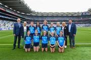 30 July 2023; The Dublin team, back row, left to right, Hannah O'Connor, Scoil Maelruain Senior, Tallaght, Dublin, Ciara Lane, Saint Attracta's Senior NS, Dundrum, Dublin, Ruth Feeney, Belgrove Girls NS, Clontarf, Dublin, Lana Comiskey, Holy Family NS, Rathcoole, Dublin, Ruth Feeney, Belgrove Girls NS, Clontarf, Dublin, front row, left to right, Lily Monahan, Scoil Naomh Iósaf, Baltinglass, Wicklow, Emily Lynam Carroll, St Mary's NS, Pullough, Offaly, Sophia Carey, Scoil Mhuire NS, Newtown-forbes, Longford, Hannah Luttrell, Presentation PS, Portarlington, Laois, Kerry Ward, St Teresa's PS, Mountnorris, Armagh, with Uachtarán Chumann Lúthchleas Gael Larry McCarthy, INTO President Dorothy McGinley, Bernie Ryan of Cumann na mBunscol, and LGFA President Mícheál Naughton, ahead of the INTO Cumann na mBunscol GAA Respect Exhibition Go Games at the GAA Football All-Ireland Senior Championship final match between Dublin and Kerry at Croke Park in Dublin. Photo by Daire Brennan/Sportsfile