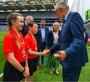 30 July 2023; GAA president Larry McCarthy with INTO Cumann na mBunscol GAA Respect Exhibition Go Games referees, Emma Thorp, St Fiachra's SNS, Beamount, Dublin, and Billy Lappin, St Pius X BNS, Terenure, Dublin, ahead of the INTO Cumann na mBunscol GAA Respect Exhibition Go Games at the GAA Football All-Ireland Senior Championship final match between Dublin and Kerry at Croke Park in Dublin. Uachtarán Chumann Lúthchleas Gael Larry McCarthy Photo by Ray McManus/Sportsfile