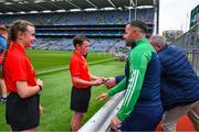 30 July 2023; Referee David Gough with INTO Cumann na mBunscol GAA Respect Exhibition Go Games referees, Emma Thorp, St Fiachra's SNS, Beamount, Dublin, and Billy Lappin, St Pius X BNS, Terenure, Dublin, ahead of the INTO Cumann na mBunscol GAA Respect Exhibition Go Games at the GAA Football All-Ireland Senior Championship final match between Dublin and Kerry at Croke Park in Dublin.  Photo by Ray McManus/Sportsfile