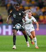 31 July 2023; Christy Ucheibe of Nigeria in action against Lily Agg of Republic of Ireland during the FIFA Women's World Cup 2023 Group B match between Republic of Ireland and Nigeria at Brisbane Stadium in Brisbane, Australia. Photo by Stephen McCarthy/Sportsfile