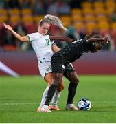31 July 2023; Christy Ucheibe of Nigeria in action against Lily Agg of Republic of Ireland during the FIFA Women's World Cup 2023 Group B match between Republic of Ireland and Nigeria at Brisbane Stadium in Brisbane, Australia. Photo by Stephen McCarthy/Sportsfile