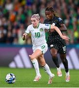 31 July 2023; Denise O'Sullivan of Republic of Ireland in action against Christy Ucheibe of Nigeria during the FIFA Women's World Cup 2023 Group B match between Republic of Ireland and Nigeria at Brisbane Stadium in Brisbane, Australia. Photo by Stephen McCarthy/Sportsfile