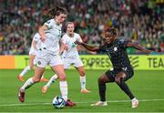 31 July 2023; Niamh Fahey of Republic of Ireland in action against Christy Ucheibe of Nigeria during the FIFA Women's World Cup 2023 Group B match between Republic of Ireland and Nigeria at Brisbane Stadium in Brisbane, Australia. Photo by Stephen McCarthy/Sportsfile