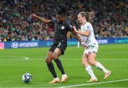 31 July 2023; Desire Oparanozie of Nigeria in action against Kyra Carusa of Republic of Ireland during the FIFA Women's World Cup 2023 Group B match between Republic of Ireland and Nigeria at Brisbane Stadium in Brisbane, Australia. Photo by Stephen McCarthy/Sportsfile