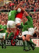 21 March 1998; Colin Charvis of Wales contests a high ball with David Corkery, left, and Paddy Johns of Ireland during the Five Nations Rugby Championship match between Ireland and Wales at Lansdowne Road in Dublin, Ireland. Photo by Brendan Moran/Sportsfile