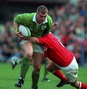 21 March 1998; Victor Costello of Ireland is tackled by Kingsley Jones of Wales during the Five Nations Rugby Championship match between Ireland and Wales at Lansdowne Road in Dublin, Ireland. Photo by Brendan Moran/Sportsfile