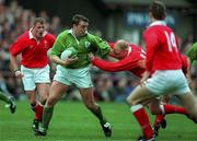 21 March 1998; Rob Henderson of Ireland is tackled by Neil Jenkins of Wales during the Five Nations Rugby Championship match between Ireland and Wales at Lansdowne Road in Dublin, Ireland. Photo by Brendan Moran/Sportsfile