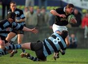 31 January 1998; Jan Cunningham of Ballymena is tackled by Anthony Foley of Shannon during the All-Ireland League Division 1 match between Shannon RFC and Ballymena RFC at Thomond Park in Limerick. Photo by Matt Browne/Sportsfile
