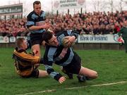 15 March 1998; Jason Hayesof Shannon scores a try despite the best efforts of Niall McNamara of Young Munster during the All-Ireland League Division 1 match between Shannon RFC and Young Munster RFC at Thomond Park in Limerick. Photo by Matt Browne/Sportsfile