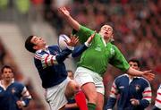 7 March 1998; Rob Henderson of Ireland contests a high ball with Jean-Luc Sadourny of France during the Five Nations Rugby Championship match between France and Ireland at the Stade De France in Paris, France. Photo by Brendan Moran/Sportsfile