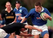 21 February 1998; John McWeeney of Mary's College is tackled by Andy Pary of Ballymena during the All-Ireland League Division 1 match between St Mary's College RFC and Ballymena RFC at Anglesea Road in Dublin. Photo by David Maher/Sportsfile