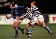 13 December 1997; Kevin Nowlan of St Mary's College is tackled by Alastair Clarke, centre, and Robin Borrow of Dungannon during the All-Ireland League Division 1 match between St Mary's College RFC and Dungannon RFC at Templeville Road in Dublin. Photo by Matt Browne/Sportsfile
