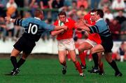 27 September 1997; Killian Keane of Munster is tackled by Lee Jarvis, left, and Rob Howley of Cardiff during the Heineken Cup Rugby Pool 4 Round 4 match between Munster and Cardiff in Musgrave Park in Cork. Photo by Brendan Moran/Sportsfile