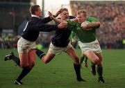 7 February 1998; Mark McCall of Ireland is tackled by Craig Chalmers, left, and Doddie Weir of Scotland during the Five Nations Rugby Championship match between Ireland and Scotland at Lansdowne Road in Dublin, Ireland. Photo by Brendan Moran/Sportsfile