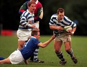 13 December 1997; Nicky Moffett of Dungannon is tackled by Richard Ormond of St Mary's College during the All-Ireland League Division 1 match between St Mary's College RFC and Dungannon RFC at Templeville Road in Dublin. Photo by Brendan Moran/Sportsfile