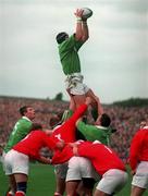 21 March 1998; Paddy Johns of Ireland wins a lineout during the Five Nations Rugby Championship match between Ireland and Wales at Lansdowne Road in Dublin, Ireland. Photo by Brendan Moran/Sportsfile