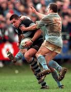 15 February 1998; Alan Quinlan of Shannon is tackled by Pat Humphreys of Garryowen during the All-Ireland League Division 1 match between Garryowen and Shannon at Dooradoyle in Limerick. Photo by David Maher/Sportsfile