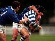 13 December 1997; Alastair Hood of Dungannon is tackled by Kelvin McNamee, left, and Karl Jennings of St Mary's College during the All-Ireland League Division 1 match between St Mary's College RFC and Dungannon RFC at Templeville Road in Dublin. Photo by Brendan Moran/Sportsfile