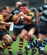 15 March 1998; Brian Buckley of Young Munster is tackled by Anthony Foley of Shannon during the All-Ireland League Division 1 match between Shannon RFC and Young Munster RFC at Thomond Park in Limerick. Photo by Matt Browne/Sportsfile