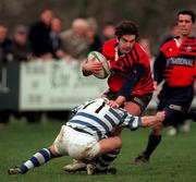 14 February 1998; Brian Carey of Blackrock College is tackled by Ronnie Carey of Dungannon during the All-Ireland League Division 1 match between Blackrock College RFC and Dungannon RFC at Stradbrook Road in Dublin. Photo by Matt Browne/Sportsfile