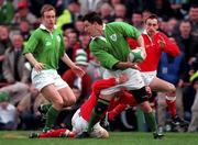 21 March 1998; Ciaran Clarke of Ireland is tackled by Neil Jenkins of Wales during the Five Nations Rugby Championship match between Ireland and Wales at Lansdowne Road in Dublin, Ireland. Photo by Brendan Moran/Sportsfile