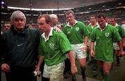 7 March 1998; Ireland team manager Pat Whelan, left, and players, from left, Conor McGuinness, Mick Galwey, Andy Ward, Eric Elwood and Peter Clohessy leave the pitch after the Five Nations Rugby Championship match between France and Ireland at the Stade De France in Paris, France. Photo by Brendan Moran/Sportsfile