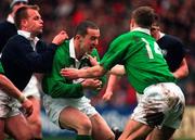 1 March 1997; Conor O'Shea of Ireland is tackled by Craig Chalmers of Scotland during the Five Nations Rugby Championship match between Scotland and Ireland at Murrayfield Stadium in Edinburgh, Scotland. Photo by Ray McManus/Sportsfile