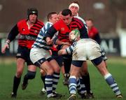14 February 1998; David Moore of Blackrock College is tackled by Michael Pattan, left, and Keith Walker of Dungannon during the All-Ireland League Division 1 match between Blackrock College RFC and Dungannon RFC at Stradbrook Road in Dublin. Photo by Matt Browne/Sportsfile