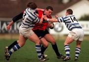 14 February 1998; David Moore of Blackrock College is tackled by Gary Leslie, left, and Nicky Moffat of Dungannon during the All-Ireland League Division 1 match between Blackrock College RFC and Dungannon RFC at Stradbrook Road in Dublin. Photo by Matt Browne/Sportsfile