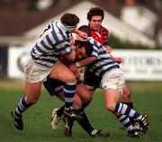 14 February 1998; David Moore of Blackrock College is tackled by Gary Leslie, left, and Nicky Moffat of Dungannon during the All-Ireland League Division 1 match between Blackrock College RFC and Dungannon RFC at Stradbrook Road in Dublin. Photo by Matt Browne/Sportsfile