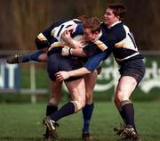 28 March 1998; Denis Hickie of St Mary's College is tackled by Barry O'Neill, left, and Cian Mahony of Dolphin during the All-Ireland League Division 1 match between St. Mary's College and Dolphin at Templeville Road in Dublin. Photo by Matt Browne/Sportsfile