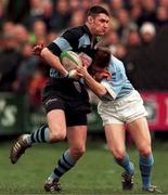 15 February 1998; Eddie Halvey of Shannon is tackled by Killian Keane of Garryowen during the All-Ireland League Division 1 match between Garryowen and Shannon at Dooradoyle in Limerick. Photo by David Maher/Sportsfile