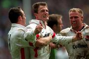 4 April 1998; Mike Catt of England celebrates with team-mates Austin Healey, left, and Neil Back after scoring a try during the Five Nations Rugby Championship match between England and Ireland at Twickenham Stadium in London, England. Photo by Matt Browne/Sportsfile