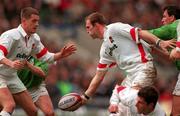4 April 1998; Laurence Dallaglio of England is tackled by Eric Elwood of Ireland during the Five Nations Rugby Championship match between England and Ireland at Twickenham Stadium in London, England. Photo by Brendan Moran/Sportsfile
