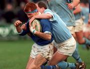 28 February 1998; Ray Mcllreavy of St Mary's College is tackled by Jack Clarke of Garryowen during the All-Ireland League Division 1 match between Garryowen and St Mary's College at Dooradoyle in Limerick. Photo by Brendan Moran/Sportsfile