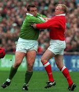 21 March 1998; Rob Henderson of Ireland is tackled by Neil Jenkins of Ireland during the Five Nations Rugby Championship match between Ireland and Wales at Lansdowne Road in Dublin, Ireland. Photo by Brendan Moran/Sportsfile