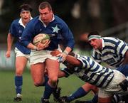 13 December 1997; Victor Costello of St Mary's College is tackled by Jonathan Boyd of Dungannon during the All-Ireland League Division 1 match between St Mary's College RFC and Dungannon RFC at Templeville Road in Dublin. Photo by Matt Browne/Sportsfile