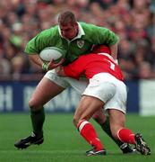 21 March 1998; Victor Costello of Ireland is tackled by Kingsley Jones of Wales during the Five Nations Rugby Championship match between Ireland and Wales at Lansdowne Road in Dublin, Ireland. Photo by Brendan Moran/Sportsfile