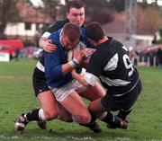 11 April 1998; Victor Costello of St Mary's College is tackled by Fergal O'Beirne, left, and Damien Ward of Old Belvedere during their All-Ireland League Divisin 1 match between Old Belvedere RFC and St Mary's College RFC at Anglesea Road in Dublin. Photo by David Maher/Sportsfile
