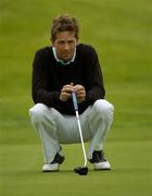 29 June 2004; Neil Manchip lines up a putt on the 18th green during the Des Smith International Pro-Am. Palmer Course, K Club, Straffan, Co. Kildare. Picture credit; Damien Eagers / SPORTSFILE