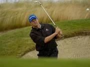 29 June 2004; Retief Goosen chips from the bunker at the 15th during a practice round. K Club, Straffan, Co. Kildare. Picture credit; Damien Eagers / SPORTSFILE