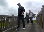 29 June 2004; Retief Goosen walks across a bridge on the way to the 16th green during a practice round. K Club, Straffan, Co. Kildare. Picture credit; Damien Eagers / SPORTSFILE
